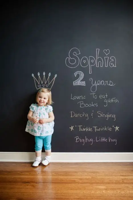 Precious photoshoot every year. Chalkboard paint one wall of their playroom.: 