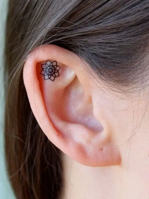ear tattoo: 