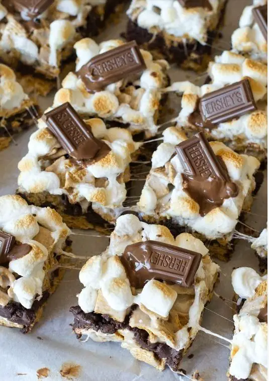 Bring the campfire inside with these S’mores brownies! Make them for your next backyard barbeque or get together. They are sure to take you back to your childhood and are always a crowd pleaser!: 