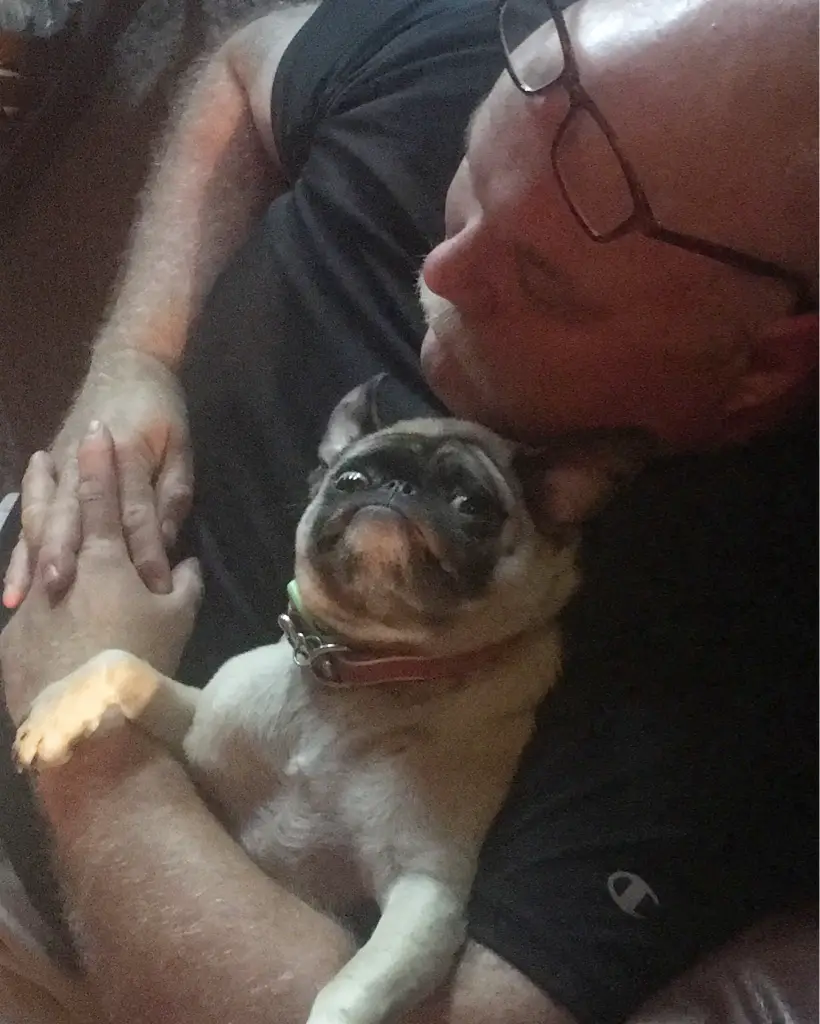 I was trying to get a cute photo of my dad and his dog sleeping together but she caught me in the act...