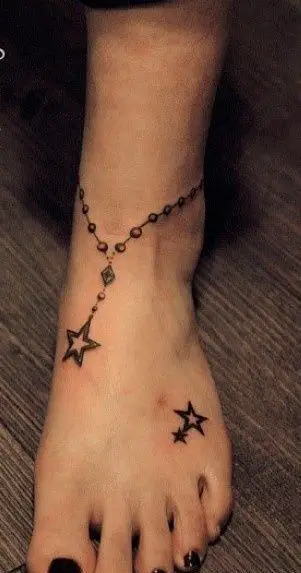 Like the two star tats on foot near toes....don't care for ankle bracelet tat: 