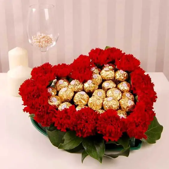 Mothers Day Gift - Heart Shaped Flower Arrangement with Candy inside. I love this idea!: 