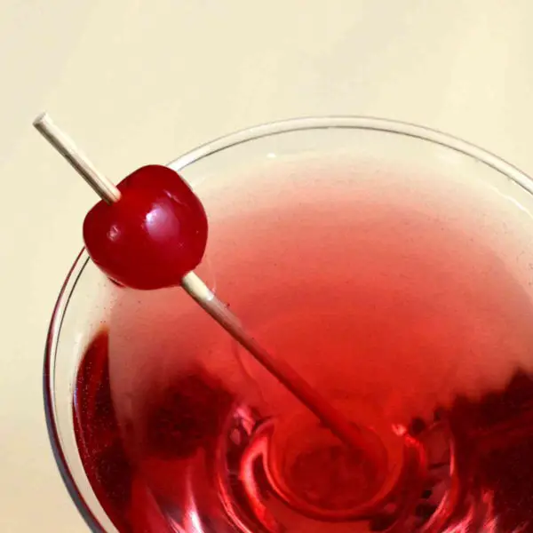 Chocolate Cherry Cha-Cha drink recipe with Malibu Rum, chocolate vodka, cherry liqueur and sparkling water.