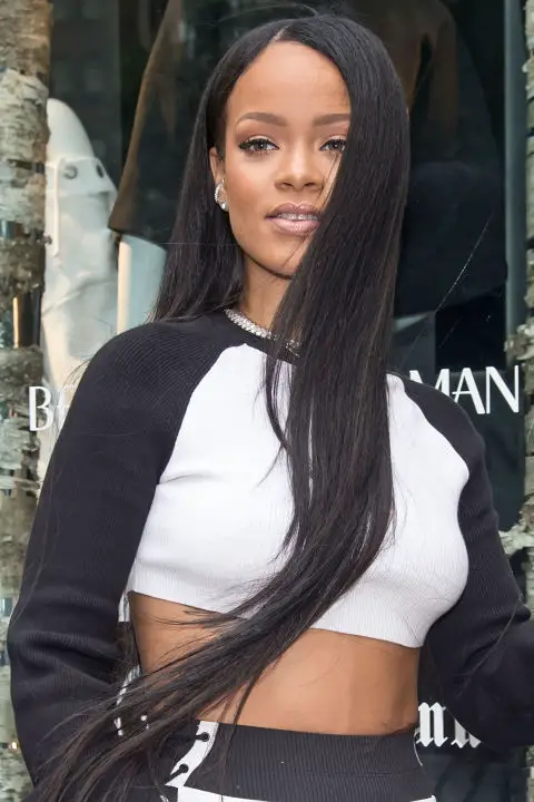  Seriously long strands give Rihanna's sporty look a girly edge. 