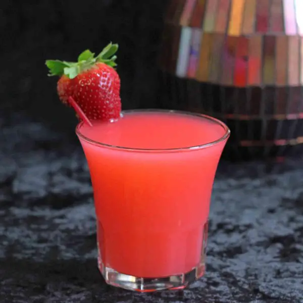 The Strawberry Blonde cocktail recipe has a couple of versions. Some make it with champagne, and others with cola. Whichever version you choose, it’s a sweet, refreshing, fruity vodka drink that’s easy to love.