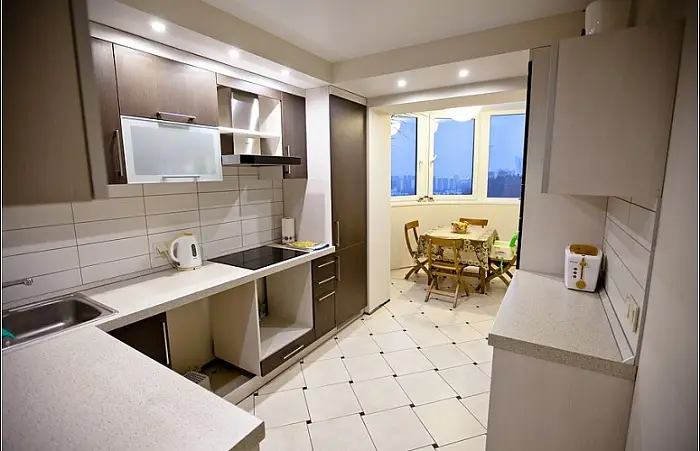 Open plan kitchen with a balcony, the room will add a couple of meters