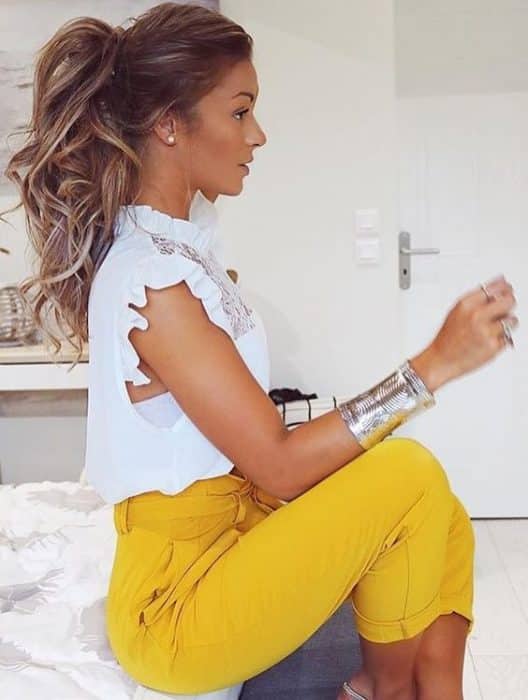 High bright colored pants with white frilly top